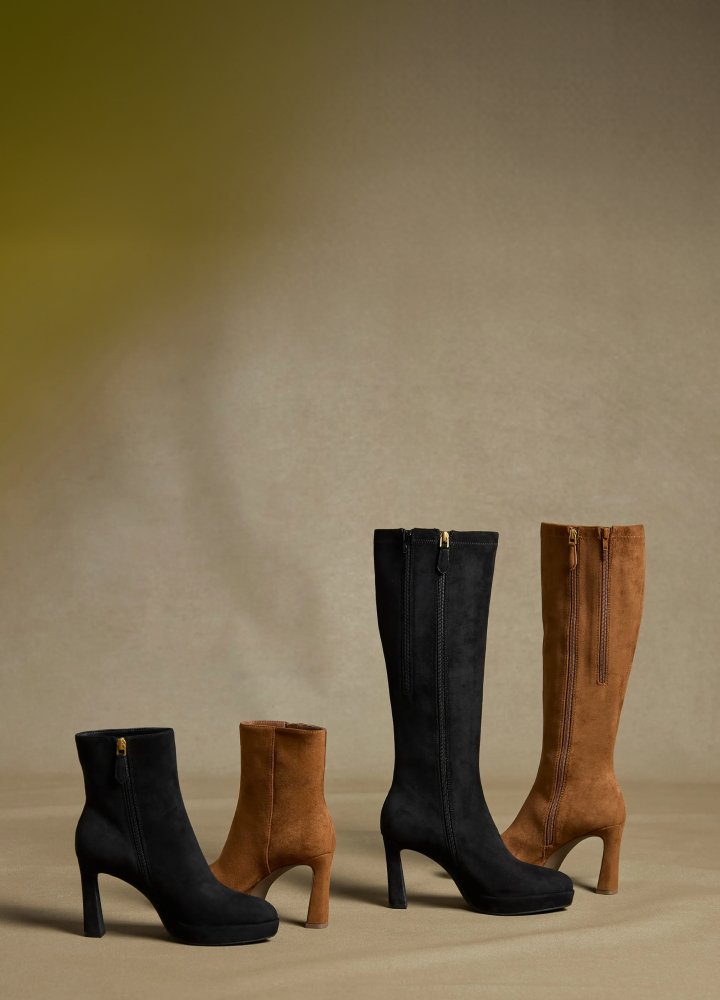 still image of women's booties and boots on studio background