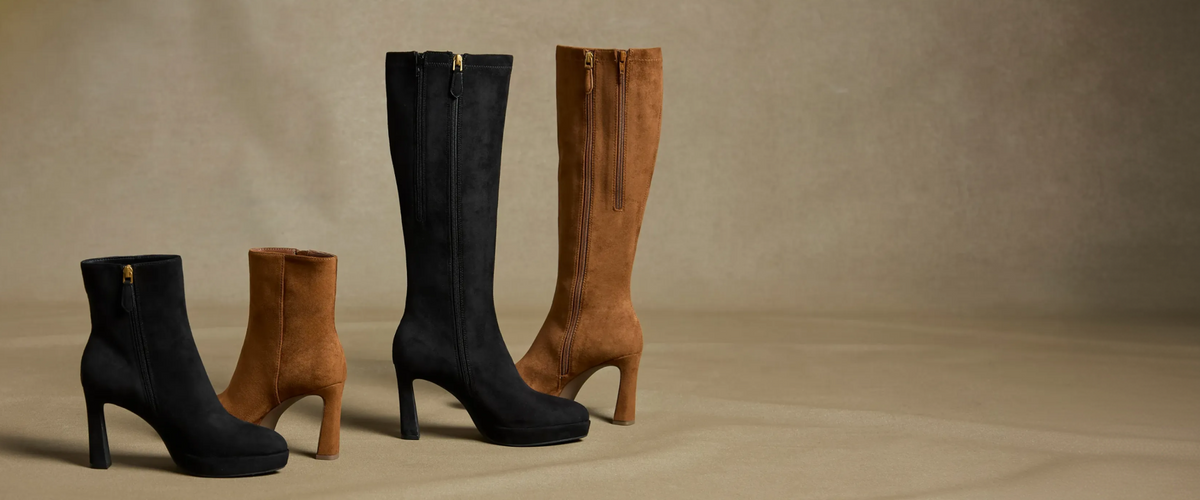 still image of women's booties and boots on studio background