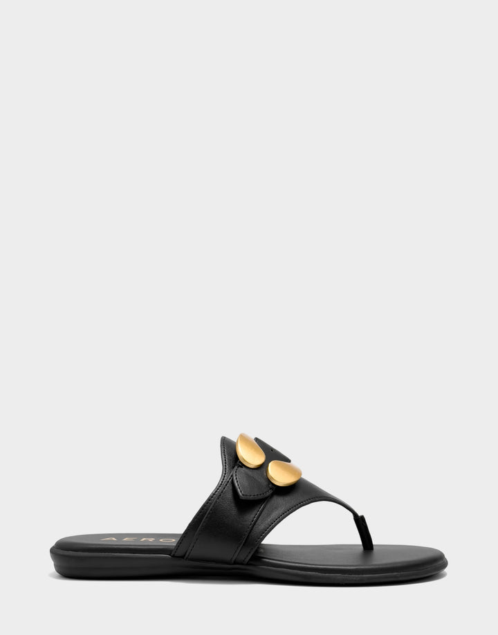 Comfortable Women's Flat Sandal in Black Faux Leather Side View