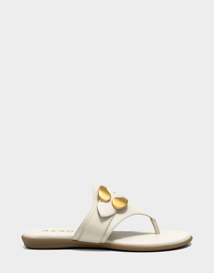 Comfortable Women's Flat Sandal in Cream Faux Leather Side View