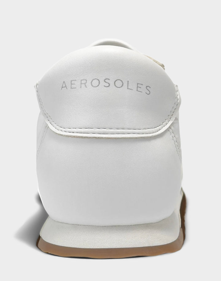 Comfortable Women's Sneaker in White/White Nylon/Faux Leather, rear view 
