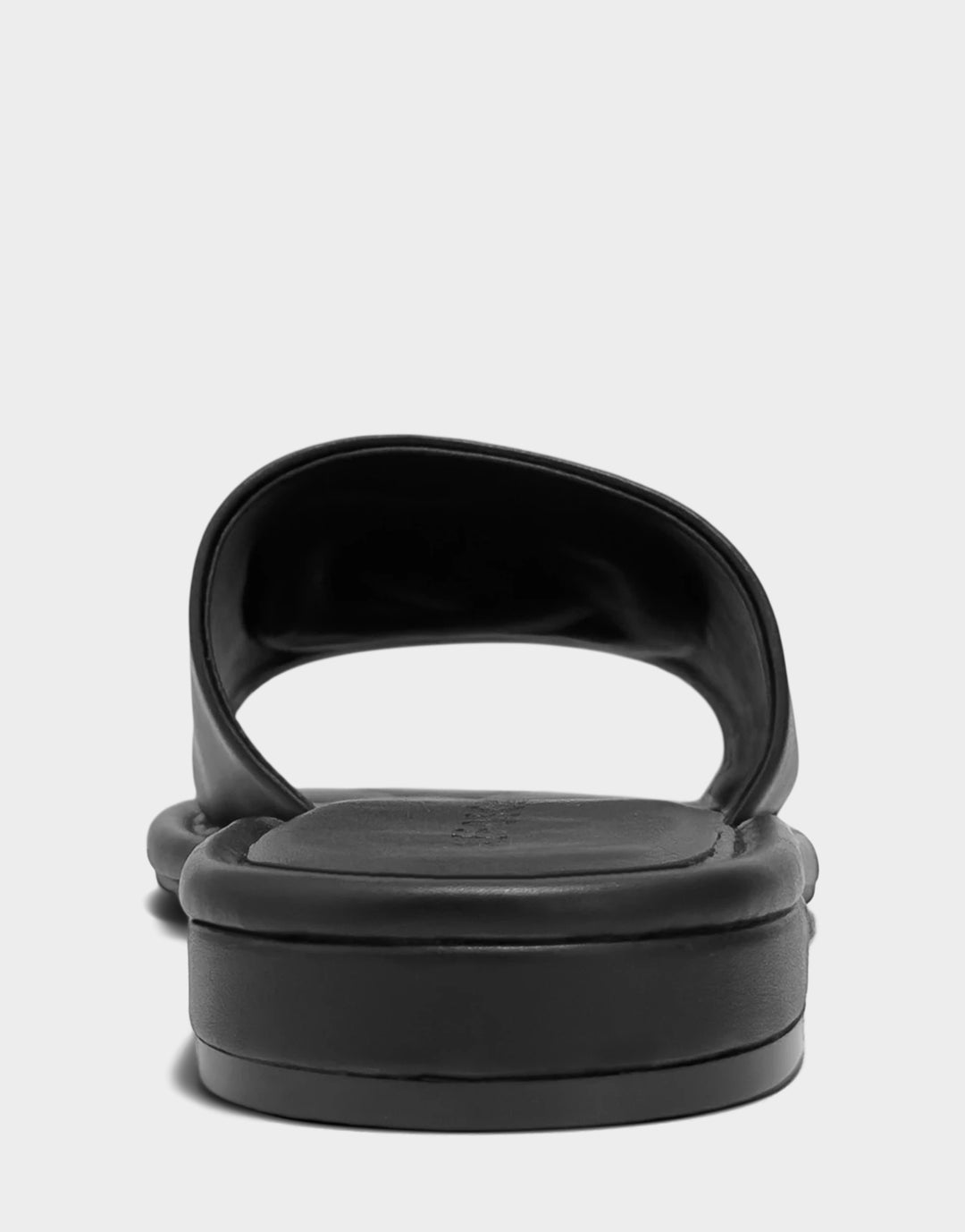 Comfortable Women's Flat Sandal in Black Faux Soft Leather, rear view 