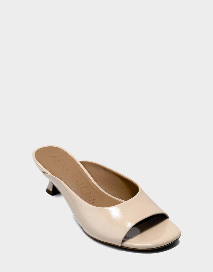 Comfortable Women's Heeled Sandal in Blue Faux Crinkle Patent Side Angle View