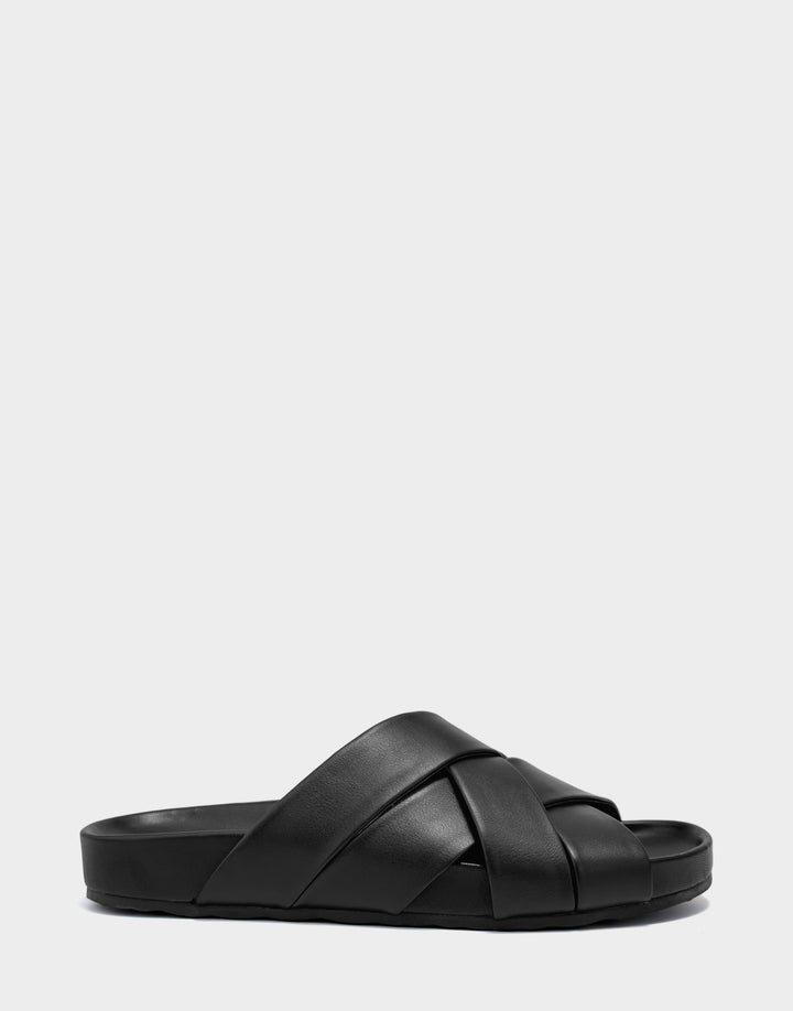 Comfortable Women's Footbed Sandal in Black Faux Leather Side View
