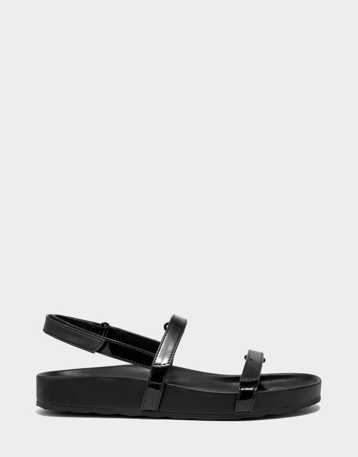 Comfortable Women's Footbed Sandal in Black Faux Patent Side View