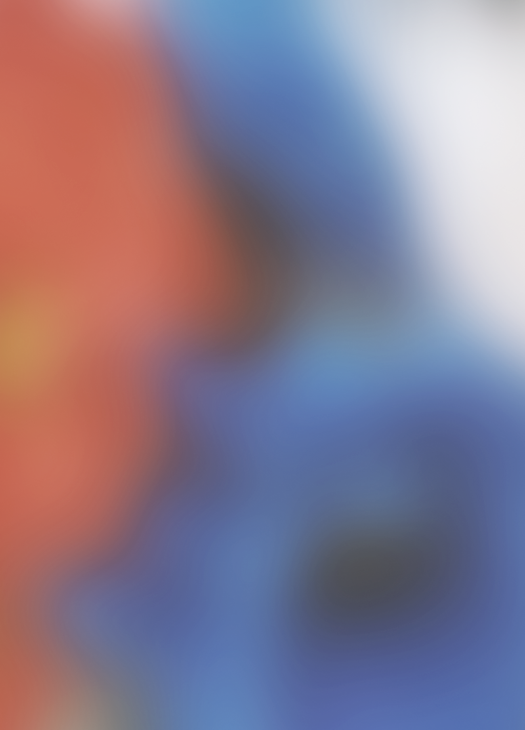 Blurred abstract image with blue and red colors