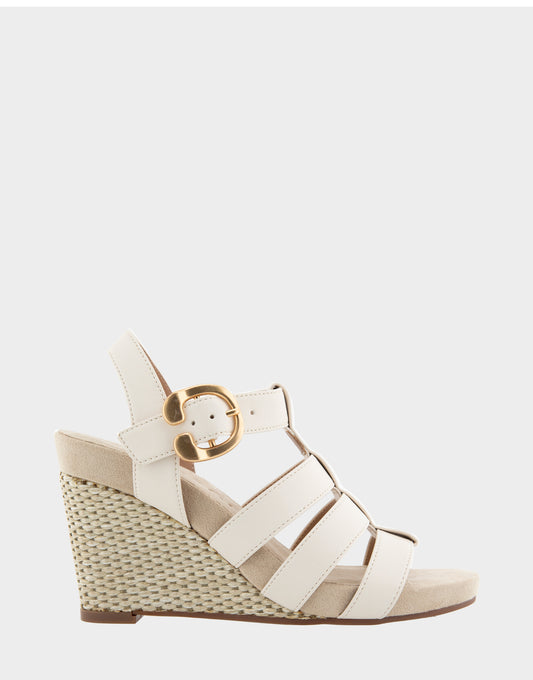 Women's Caged Footbed Wedge Sandal in Eggnog Faux Leather